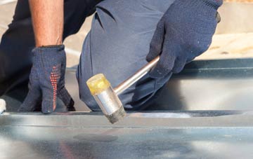 Intack metal flat roofing repairs