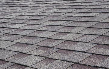 Intack tiles for shallow pitch roofing
